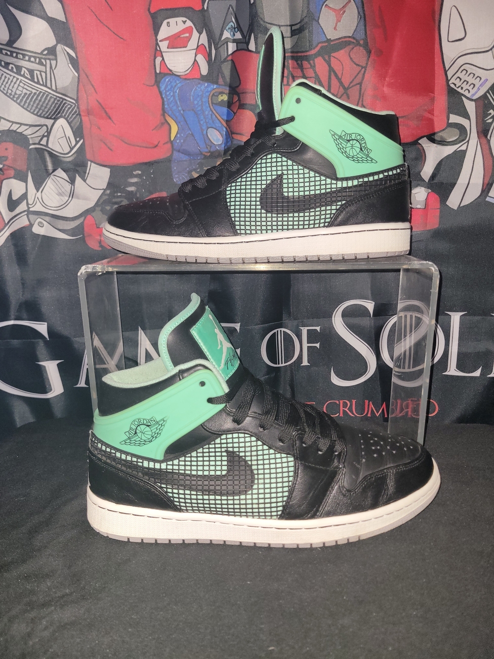 Jordan 1 Retro Black and Mint Green Glow Hi-Top Sneakers